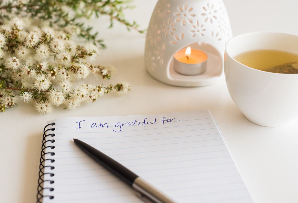 Notebook with "I am grateful for" in handwritten text - Courtney Beck I am grateful for...